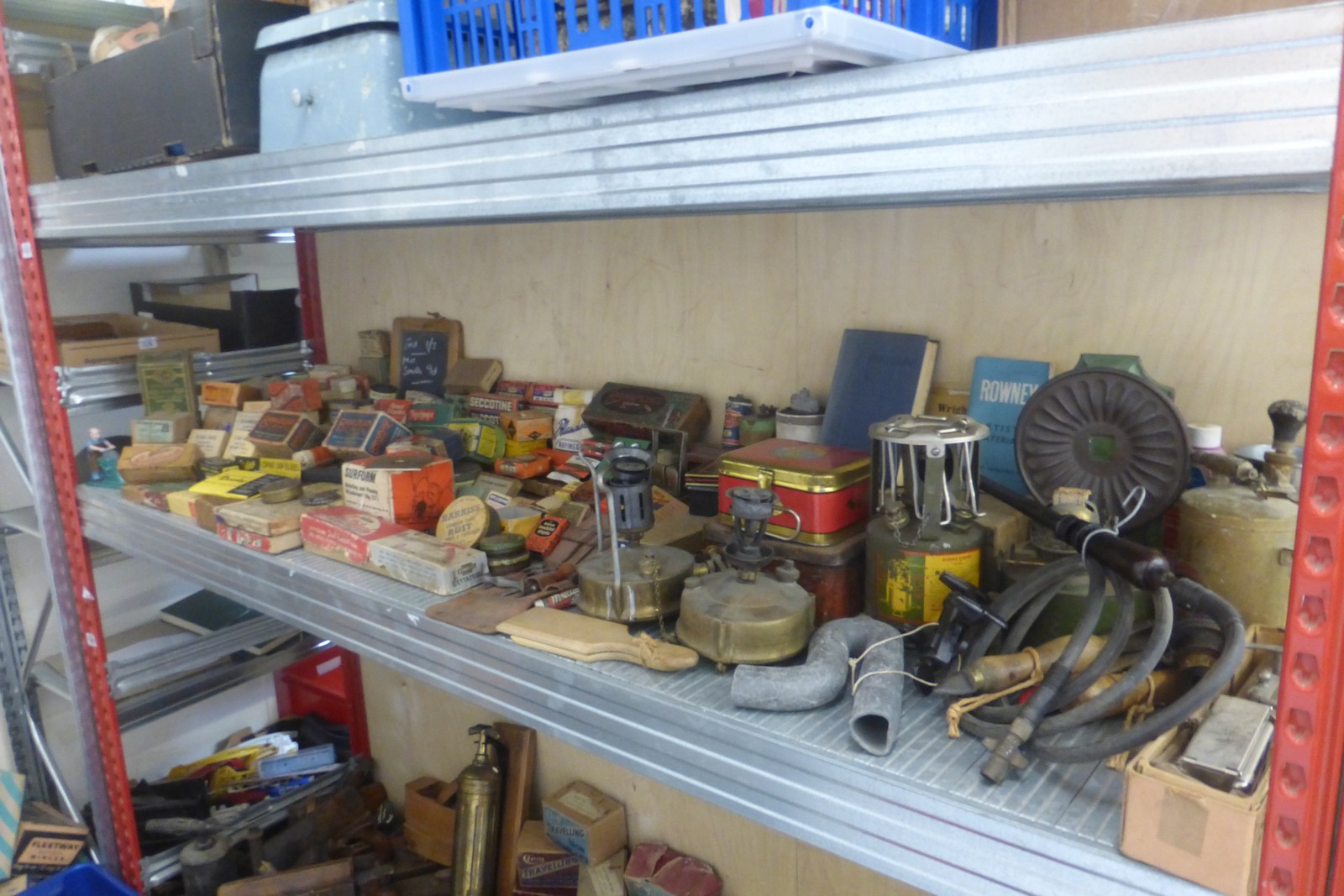 A large quantity of packaging and equipment relating to an early ironmongers.