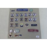 A card of assorted railway badges including Driver Conductor, London Transport, 14 National,