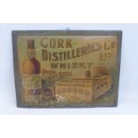 A Cork Distilleries Ltd Whisky pictorial tin advertising sign, 16 1/2 x 12 1/2".