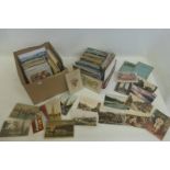 Two boxes of assorted postcards, some early, many foreign including locations such as Buenos