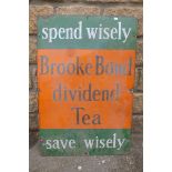 A Brooke Bond dividend Tea "Spend wisely, save wisely" rectangular enamel sign, 20 x 30".