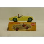 DINKY TOYS - TR2 Sports, no. 105, in good condition, yellow box fair with one end flap missing.