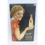 A Phillips' Gold Seal Mineral Waters pictorial celluloid showcard depicting a glamorous lady holding