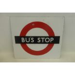 A Bus Stop rectangular enamel sign, 17 1/2 x 15 1/2".