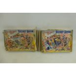 Two Enid Blyton Secret Seven jigsaw puzzles, both with competition leaflets inside, one with a piece