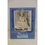 A Bluebird stockings showcard, depicting "Anne Francis", star of "Forbidden Planet", 12 1/4 x 15 1/