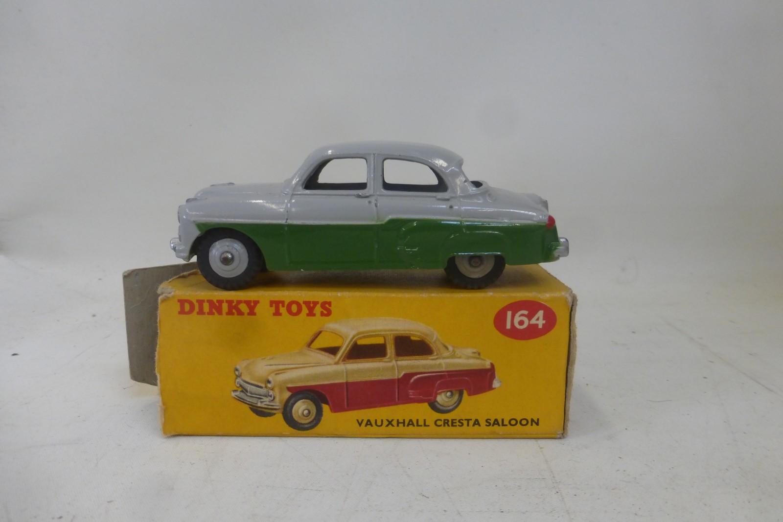 DINKY TOYS - Vauxhall Cresta, no. 164, in excellent condition, yellow box fair/good with correct