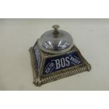 A rare "Ask for "Bos" Whisky" counter top bell with four enamel panels to the sides.