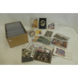 A box of assorted postcards.