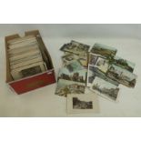 A box of assorted postcards.