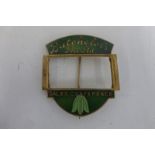 A Batchelor's Peas Ltd Sales Conference green enamel badge.