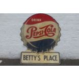 A large partly embossed Pepsi-Cola "Betty's Place" shaped tin advertising sign, marked to lower