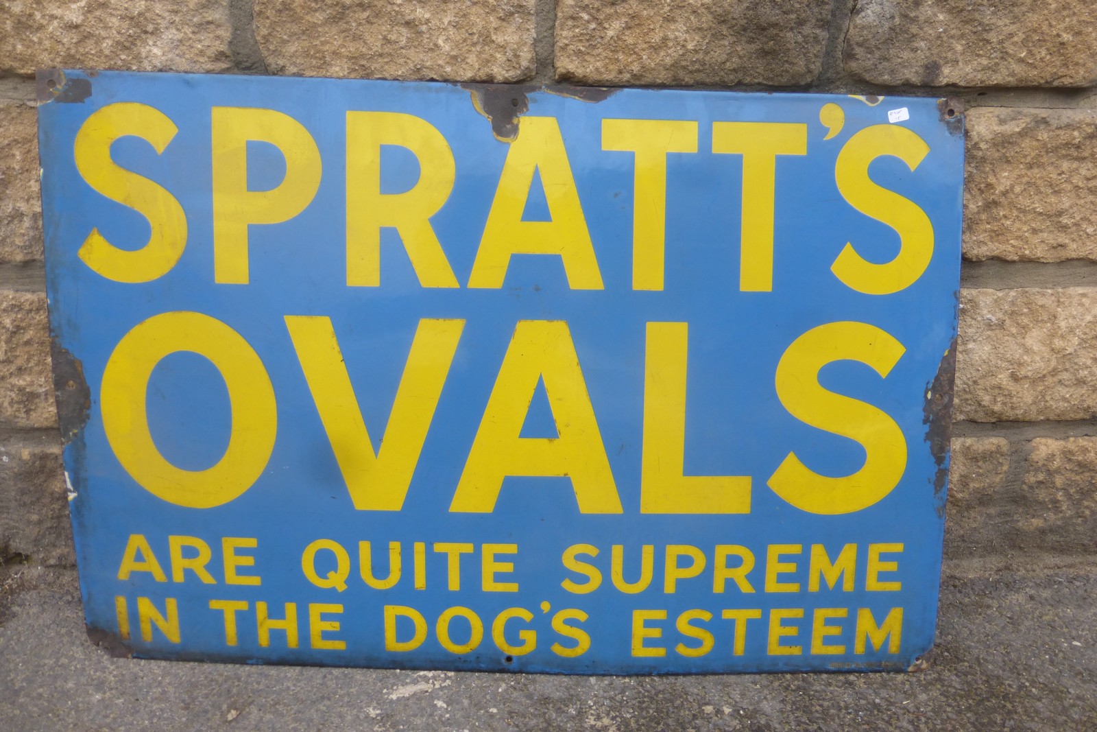 A Spratt's Ovals "are quite supreme in the dog's esteem" rectangular enamel sign by Bruton of