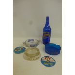 A selection of glass ashtrays including Wills' Gold Flake and Capstan; also a Babycham blue glass