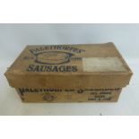 A Palethorpes' Royal Cambridge Sausages cardboard box.