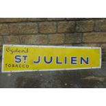 An Ogden's St. Julien Tobacco rectangular enamel sign, of tapering shape, 56 x 16"(max).