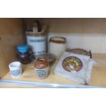 A selection of kitchenalia, mostly with advertising including a stoneware jar marked Gorgonzola C. &