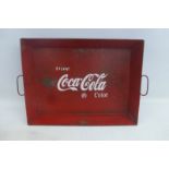 A rectangular Coca-Cola two handled tray with embossed lettering.