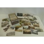 A box of assorted postcards.