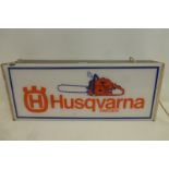 A Husqvarna of Sweden power tools dealership lightbox, 29 1/2 x 10 x 5".