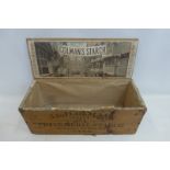 A Colman's Starch wooden counter top dispensing box with unusual paper label depicting "Old