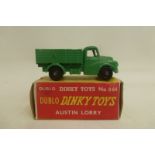 DINKY DUBLO - Austin Lorry, no. 064, in very near mint condition, black plastic wheels, yellow/red