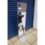 A floor standing perspex display stand.