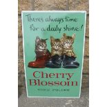 A Cherry Blossom Show Polish pictorial tin advertising sign depicting three kittens sat in boots, 17