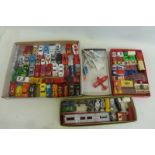 Four trays of mostly unboxed die-cast models including a "Matchbox Shop Accessory Pack", Matchbox