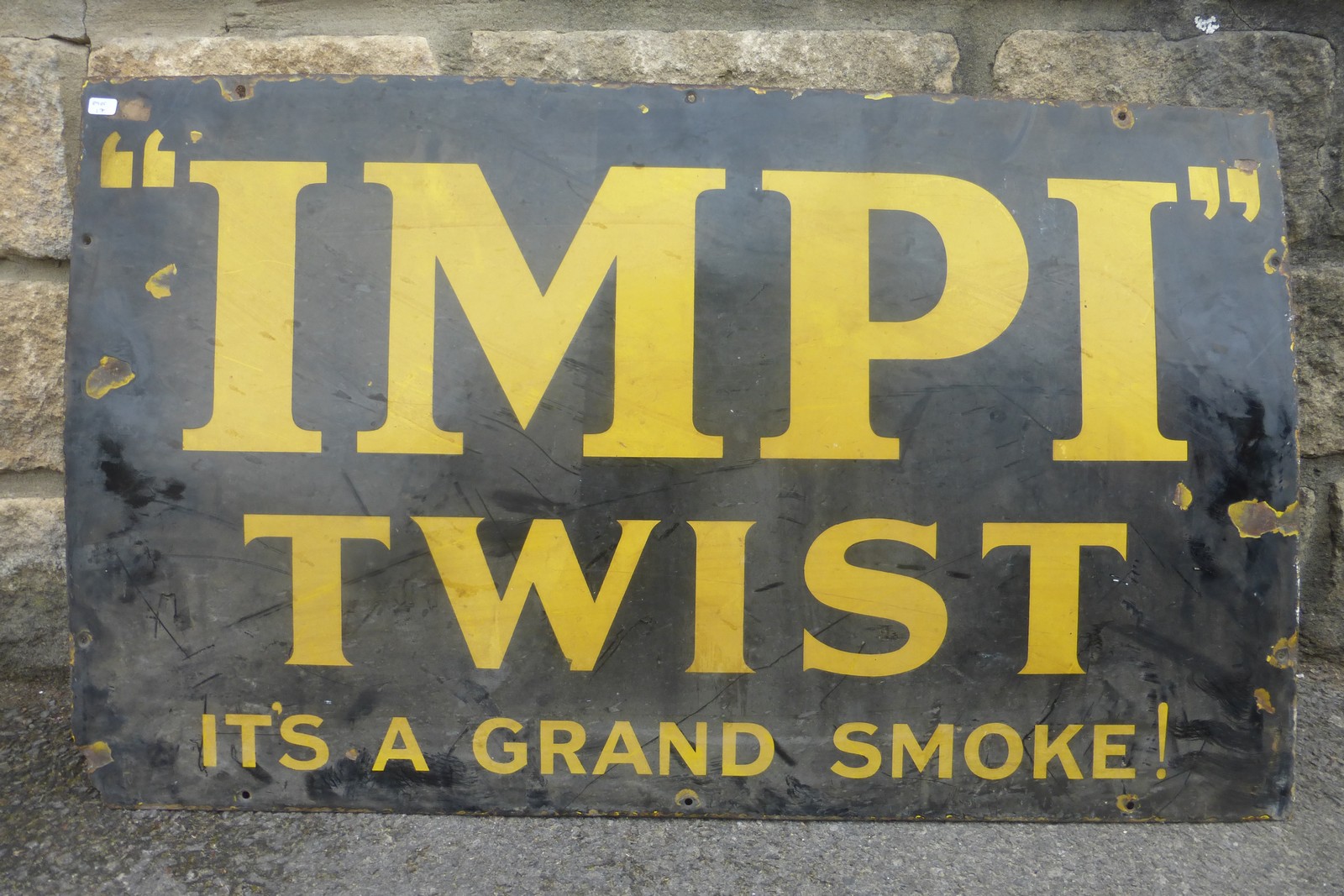 An "Impi" Twist rectangular enamel sign, 30 x 18".