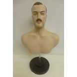 A 1930s barber's advertising display figure, head, shoulders and partial torso, set on a chromed and