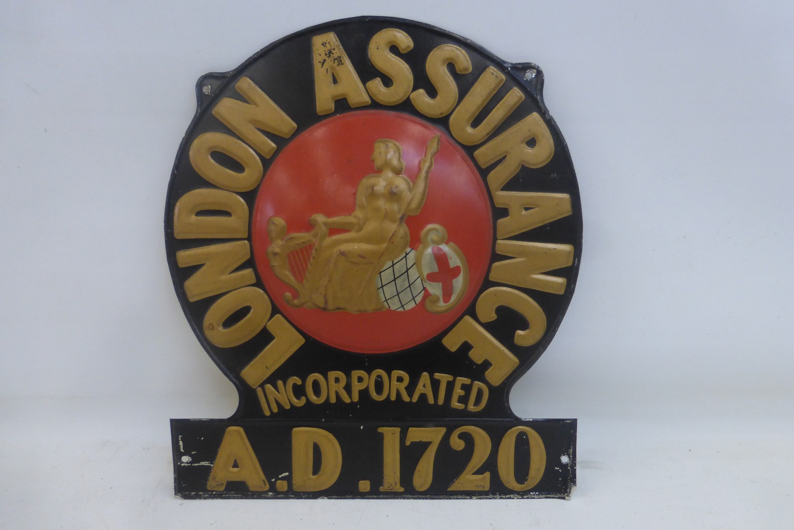 A London Assurance embossed tin wall plaque, 10 x 11 3/4".