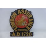 A London Assurance embossed tin wall plaque, 10 x 11 3/4".