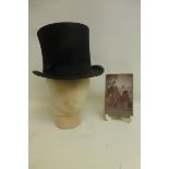 A Tom Moore & Son of Camborne top hat with an accompanying early photograph taken by Bennetts of
