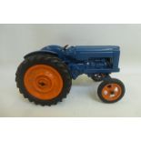 A Chad Valley Fordson tractor in mid blue.