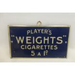 A Player's "Weights" Cigarettes tin sign, 7 x 4".