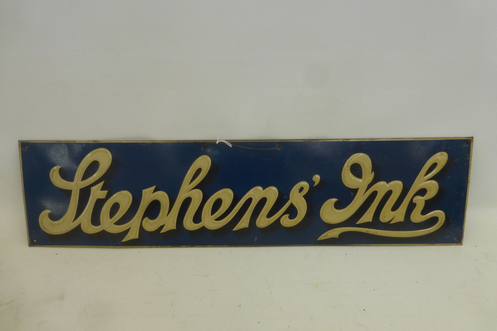 A Stephens' Ink embossed tin rectangular sign, 24 x 6".