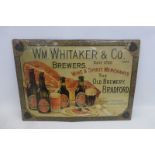 A Wm. Whitaker & Co. Brewers embossed tin sign, 21 1/2 x 15 1/2".