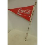 A Coca-Cola flag shaped double sided metal advertising sign, on mounting pole, 29 1/2 x 15 1/4".