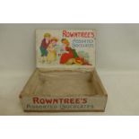A Rowntree's Assorted Chocolates counter top dispensing box with bright paper label to the inside of
