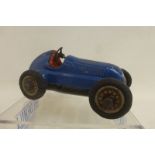 A Schuco Studio tinplate clockwork model of a Mercedes No. 3 single seater racing car.