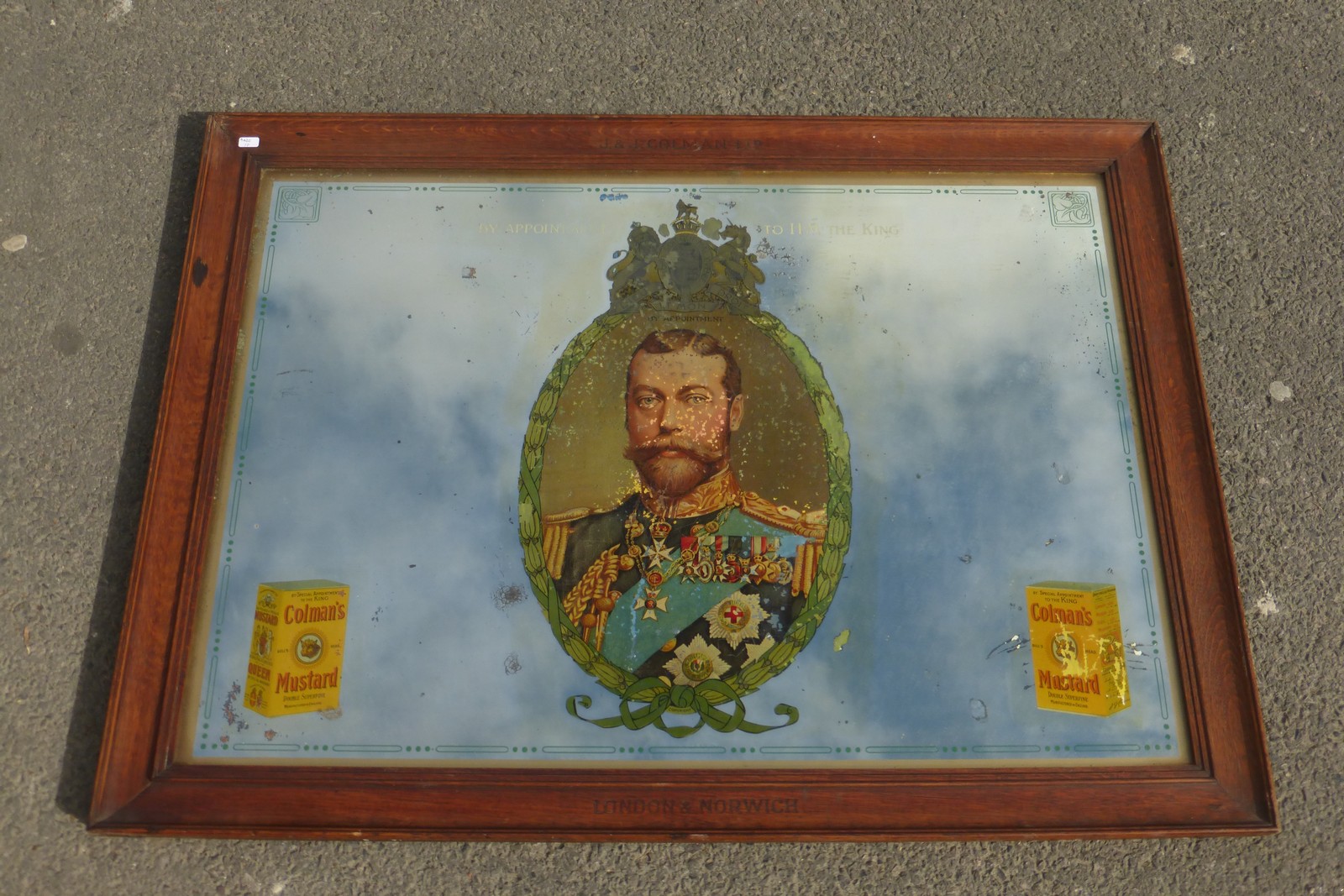 A large Colman's Mustard pictorial advertising mirror depicting an image of King George V to the