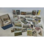 A small box of early American postcards including native Americans, food factories, flour mills,