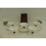 A collection of Rover related crockery including cups and saucers and also a leather covered