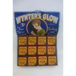A Wynter's Glow 3d pictorial display showcard, complete with twelve packets still attached, a rare