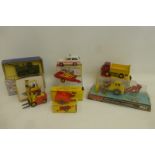 DINKY TOYS - seven boxed models including a Recovery Tractor, no. 661, a Police Patrol Range