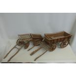 Two large good quality wooden and brass mounted scale model farm carts.