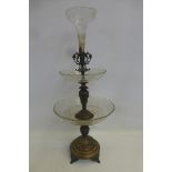 A good quality late 19th Century etched glass and brass centrepiece of three tiers raised on