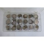 A box of pre 1947 silver coins.