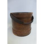 A leather bucket with a zinc liner.